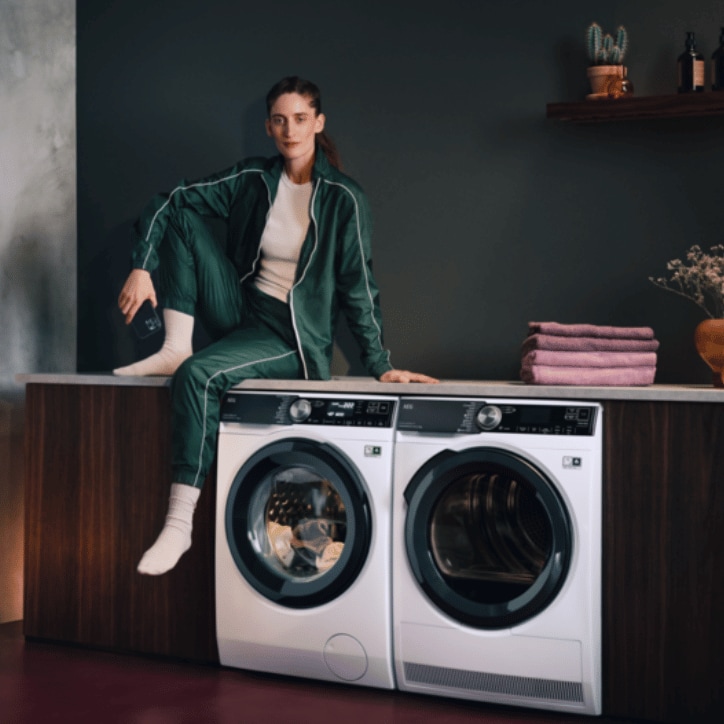 Man next to washing machines